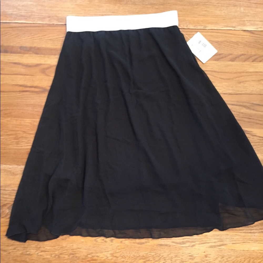 Black, chiffon overlay skirt.